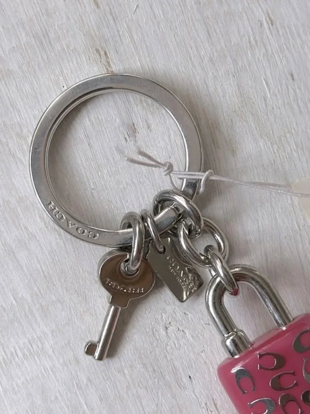 COACH LOCK AND KEY KEY RING  PURSE CHARM PINK AND SILVER NEW NWT (RETIRED) W/BOX